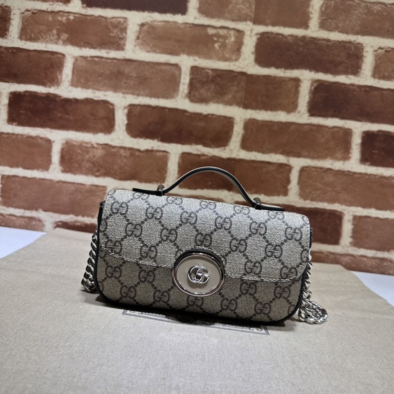 G*u*i top handle bags